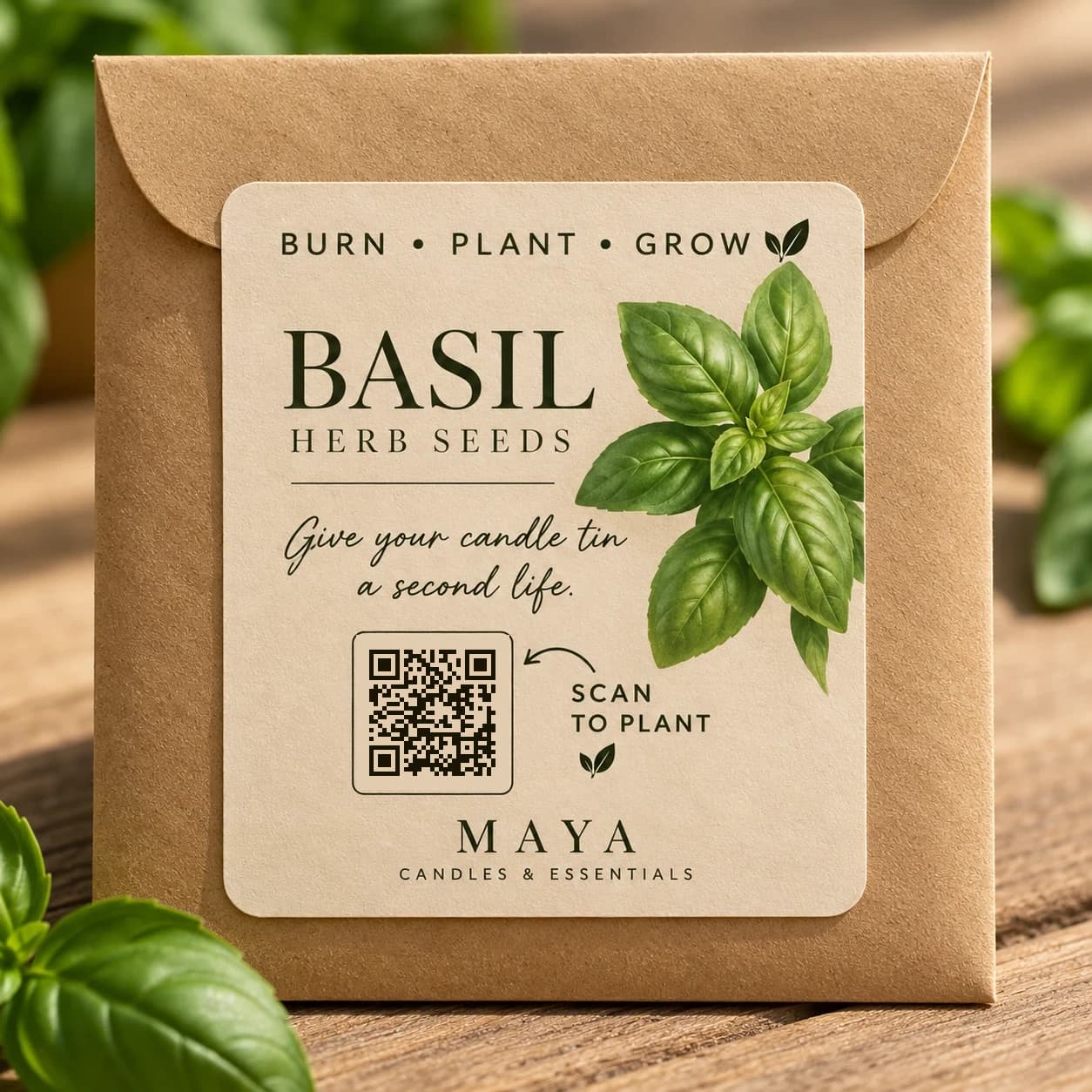 The kraft seed packet packed with every candle, reading Burn, Plant, Grow, basil herb seeds